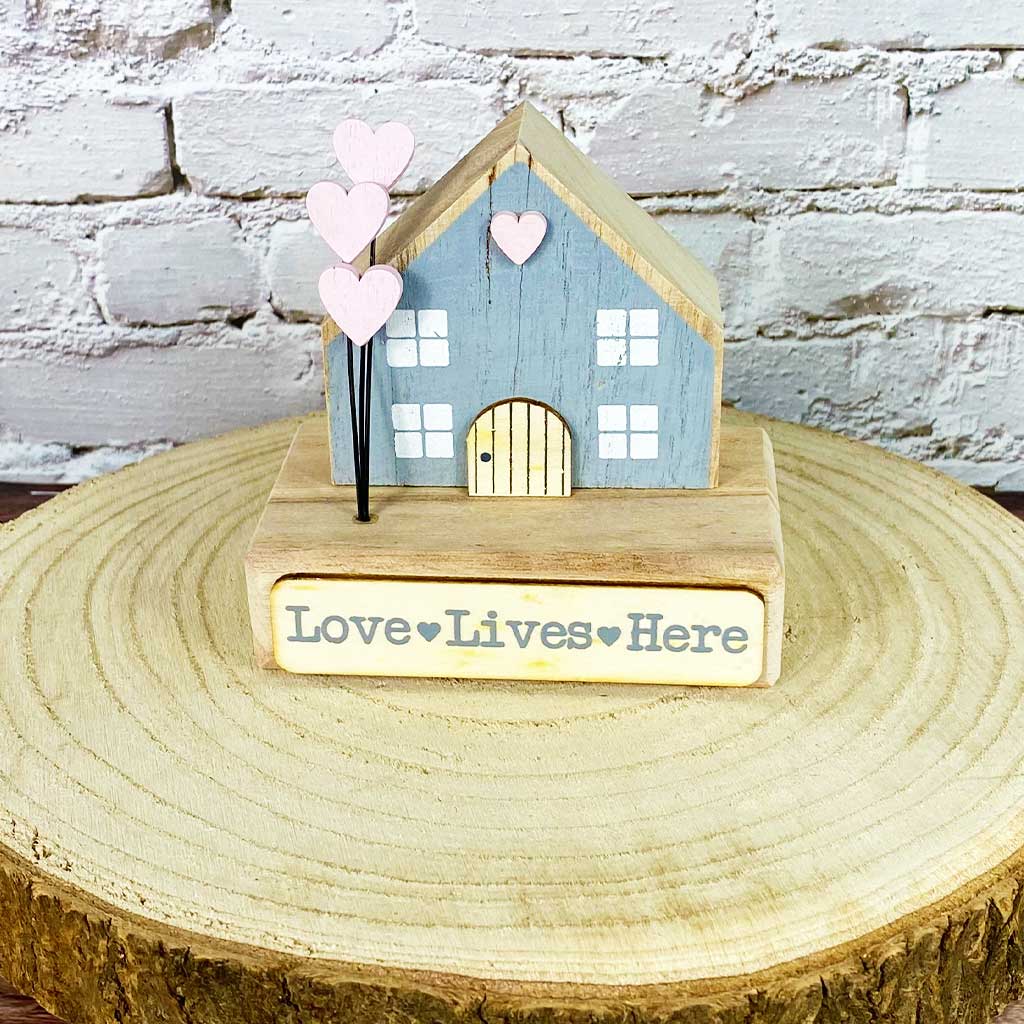 Love Lives Here Wooden House
